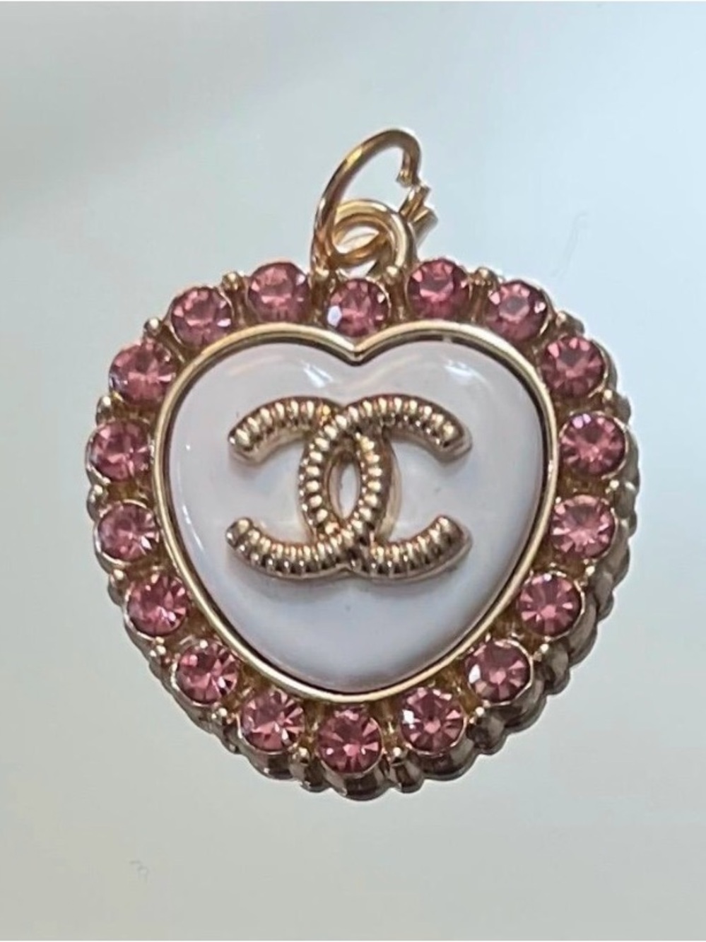 CHANEL Gold-Tone Heart Pendant with White Enamel and Pink Crystals